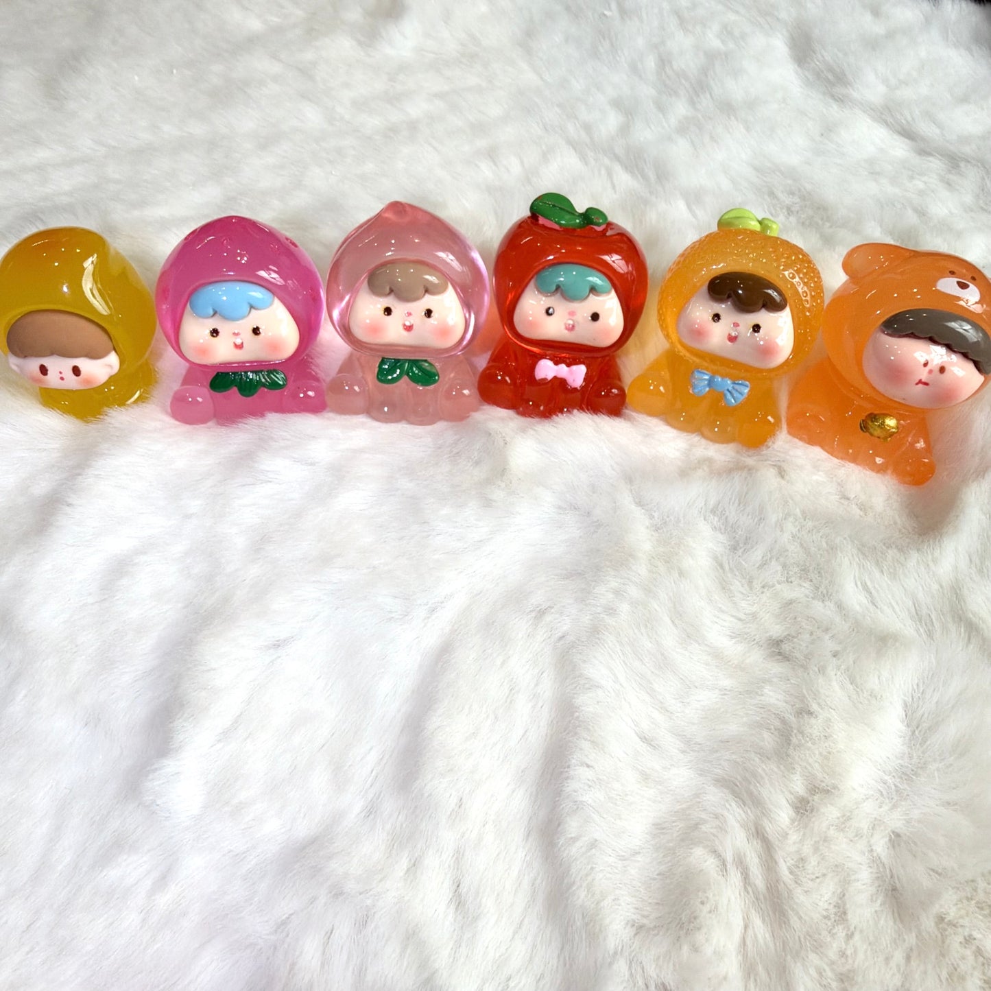 Figurines fruit phosphorescentes