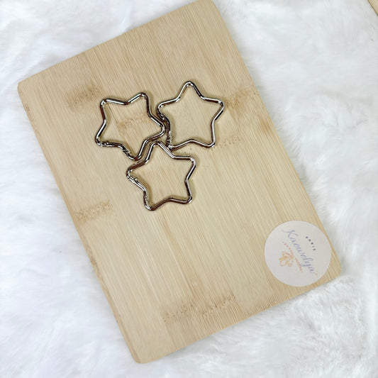 Mousqueton étoile argent–Vendu à l’unité